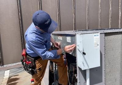 man working on commercial HVAC